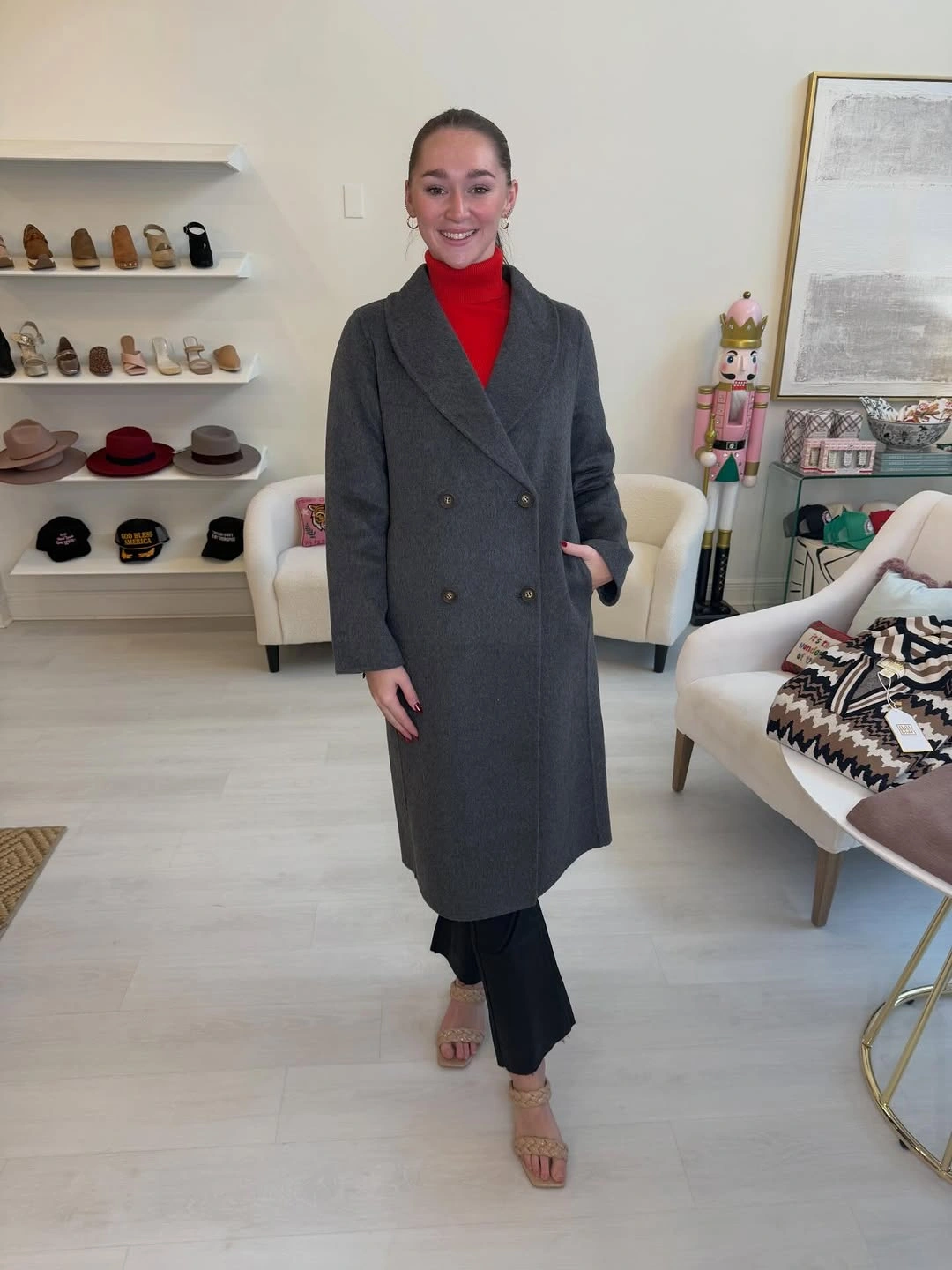 Dark gray double-breasted coat with red high-neck top