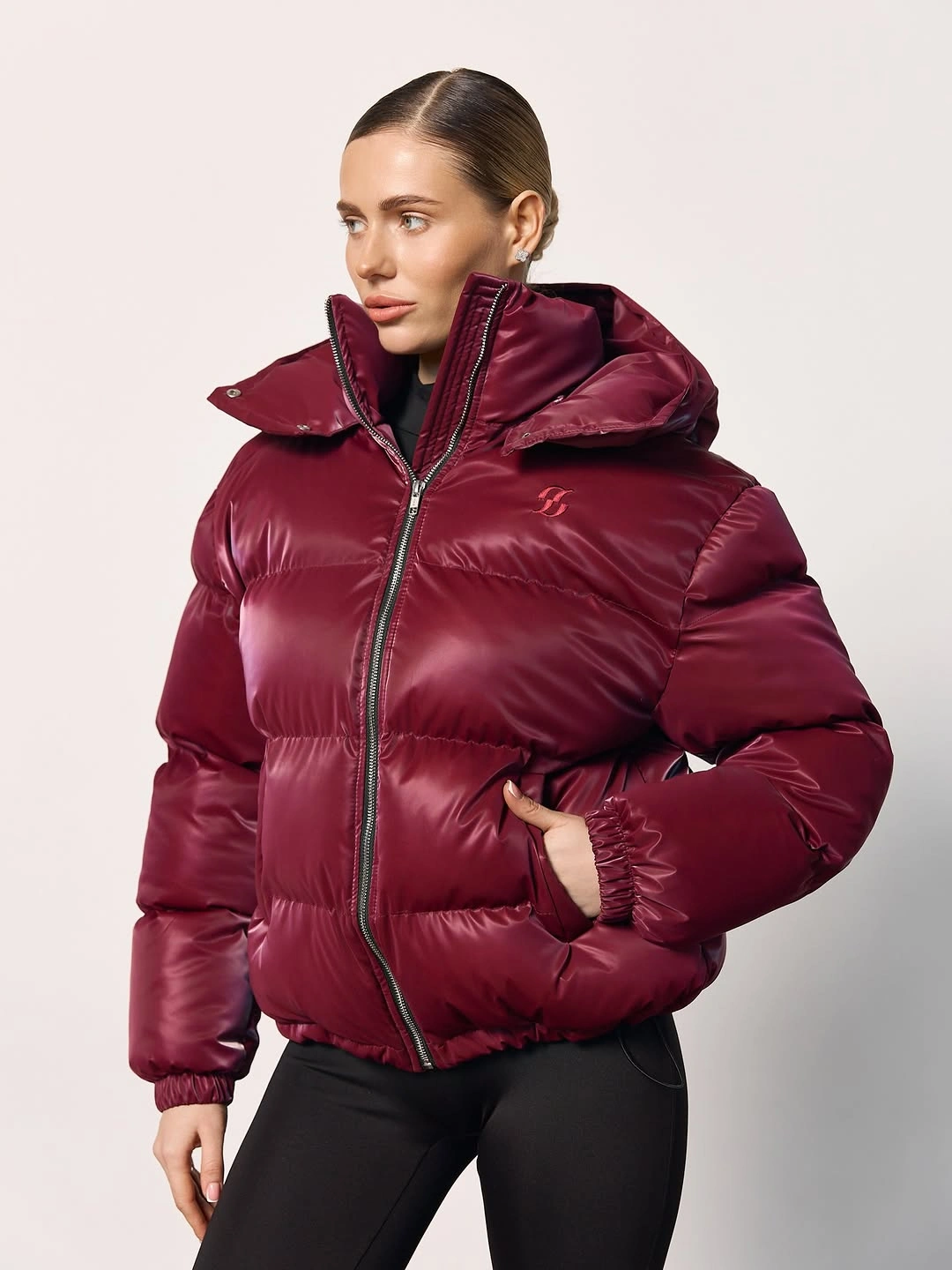 Glossy burgundy cropped puffer with black leggings