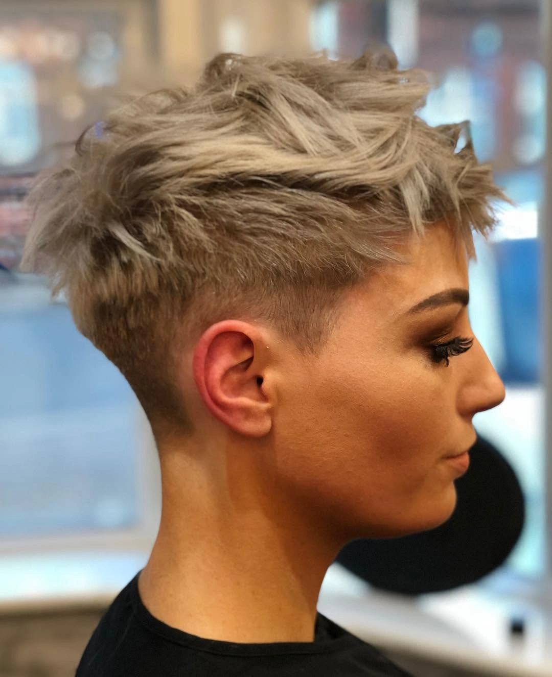 Short blonde textured crop with close sides and lifted top