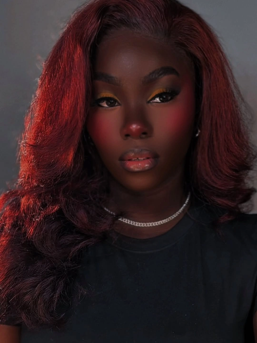 Long burgundy waves with side volume and dark top