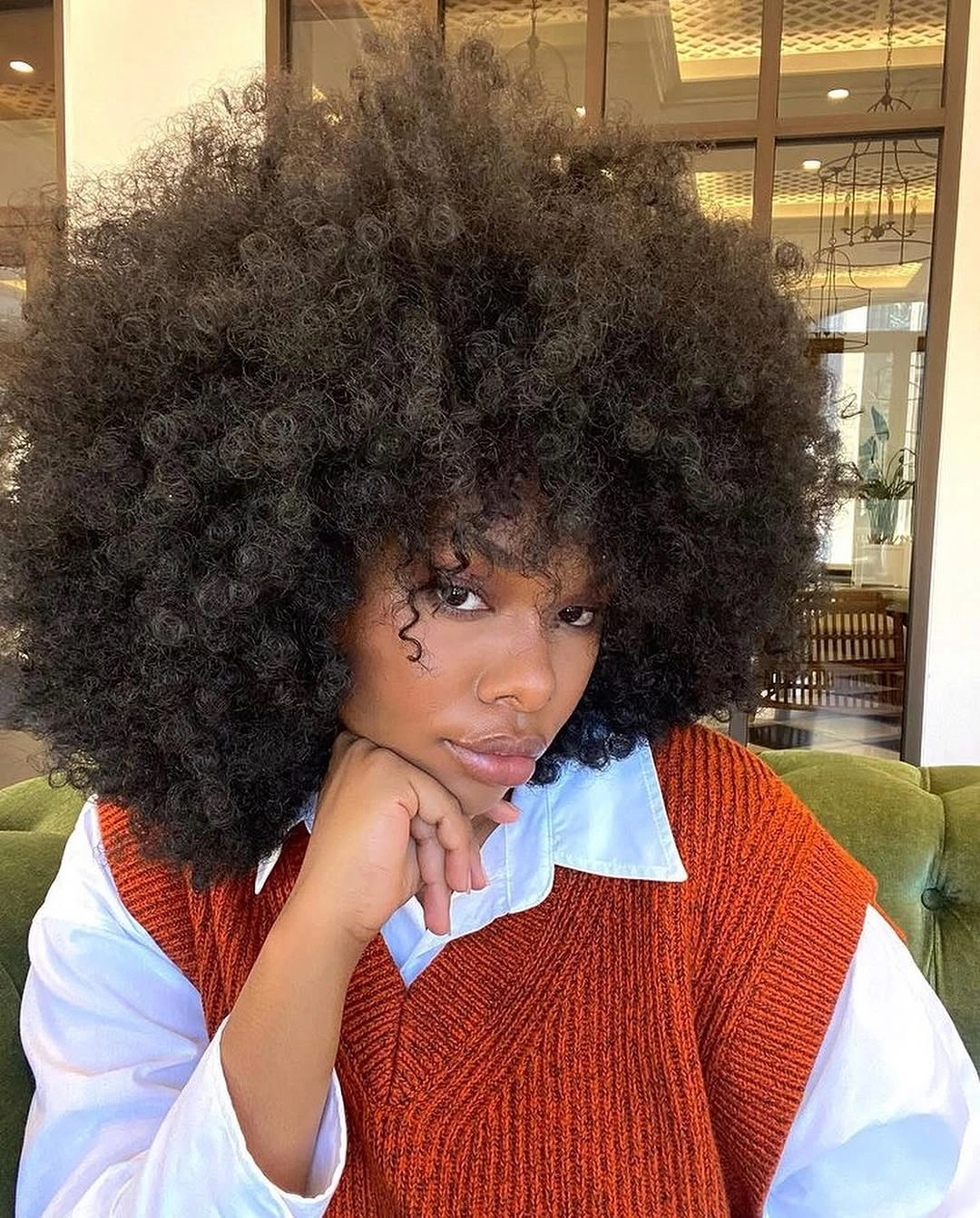 Full rounded curls with small curl near the face