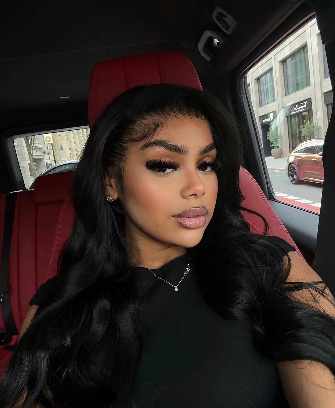 Long black waves with side sweep and styled edges