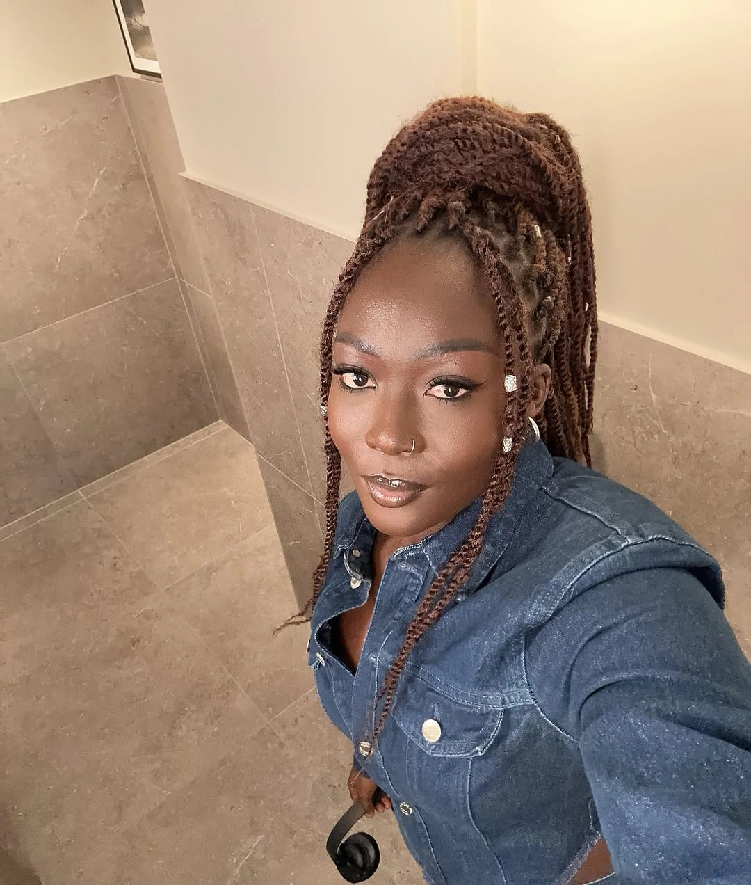 High gathered brown braids with long face pieces