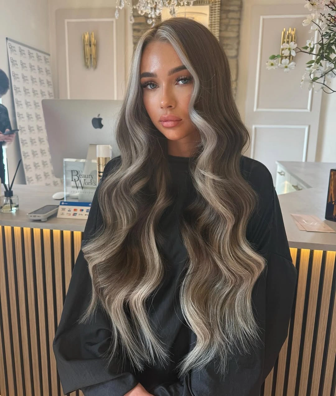 Long gray-brown waves with pale face-framing pieces