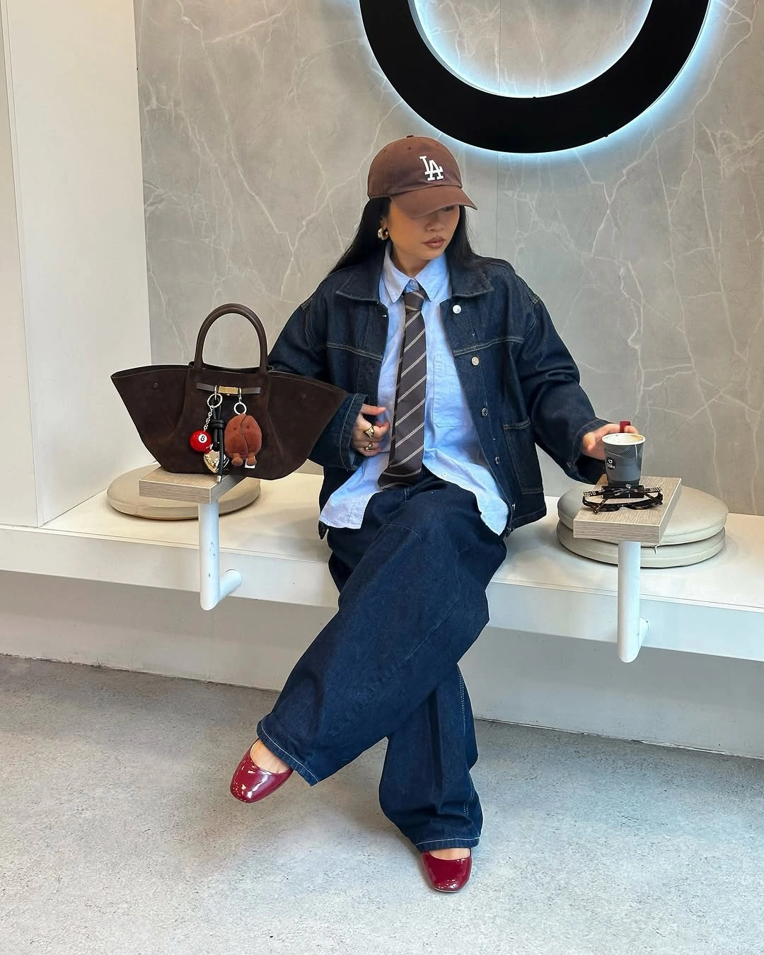 Denim jacket, blue shirt, striped tie and glossy red shoes