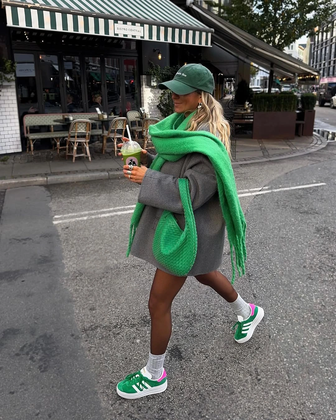 Gray oversized jacket with green scarf, cap, bag and sneakers