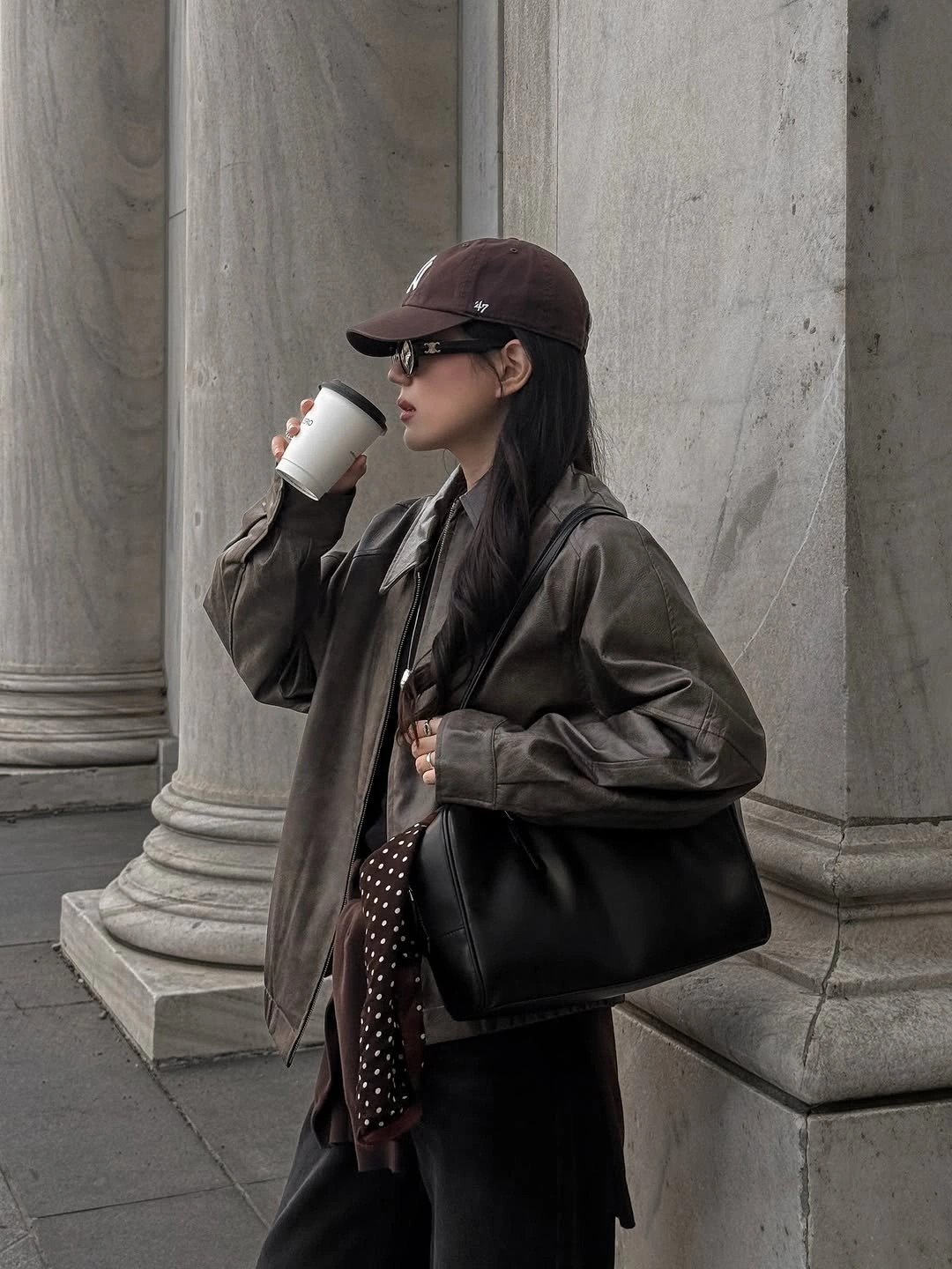 Brown cap and oversized worn-effect jacket with black tote