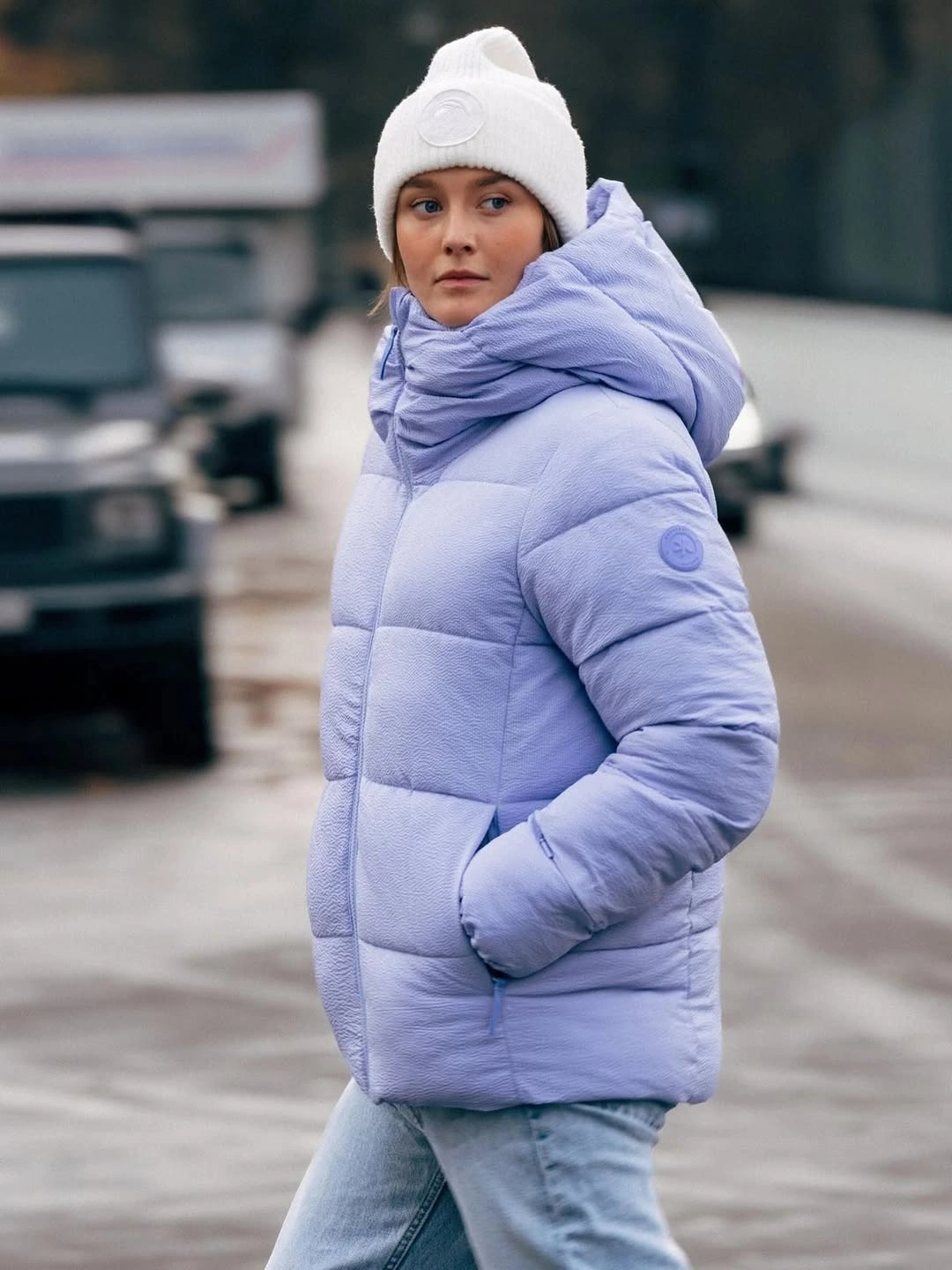 Lavender puffer with matching scarf white beanie and pale jeans