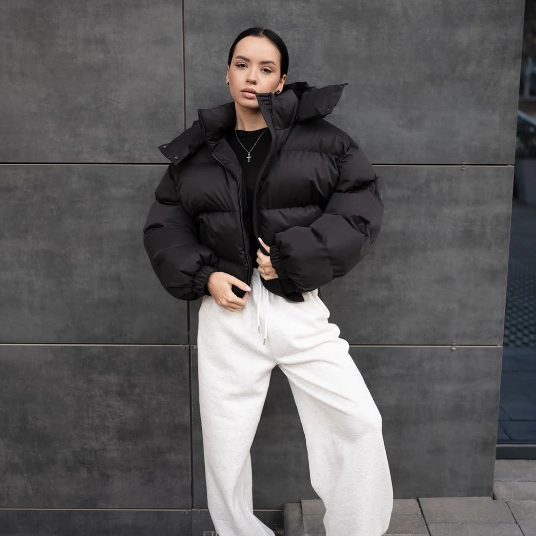 Black cropped puffer with loose white drawstring trousers
