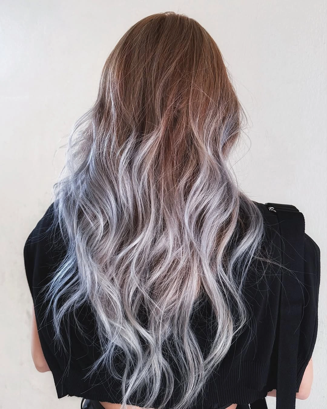 Very long waves with chestnut copper upper hair and lavender grey ends