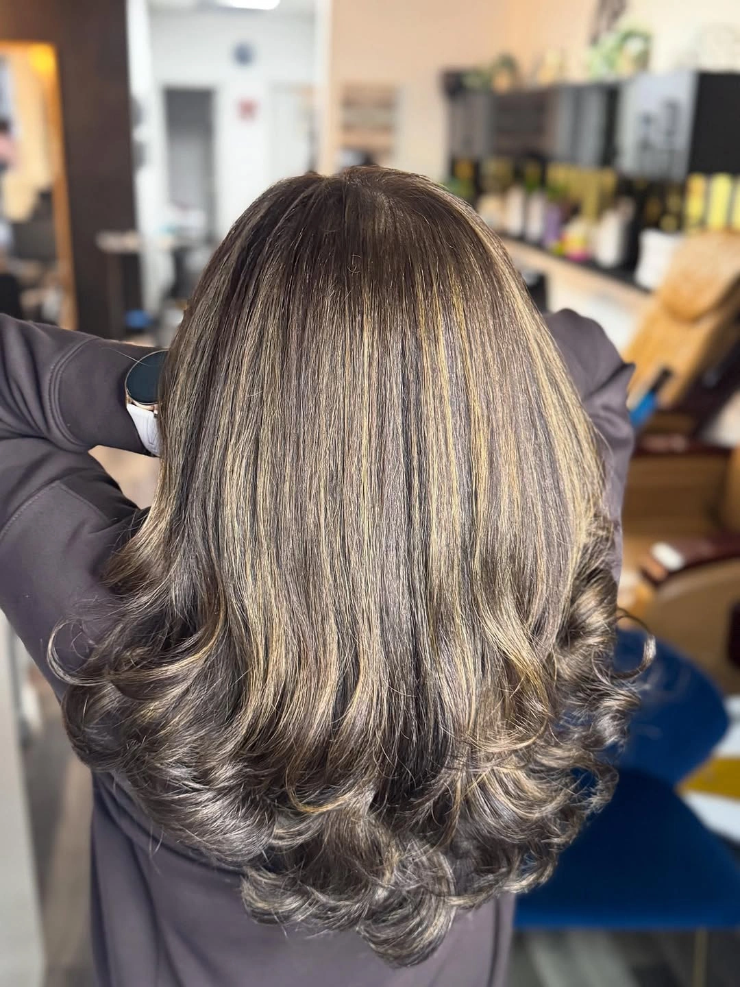 Long layered brown hair with beige taupe gold ribbons and darker crown