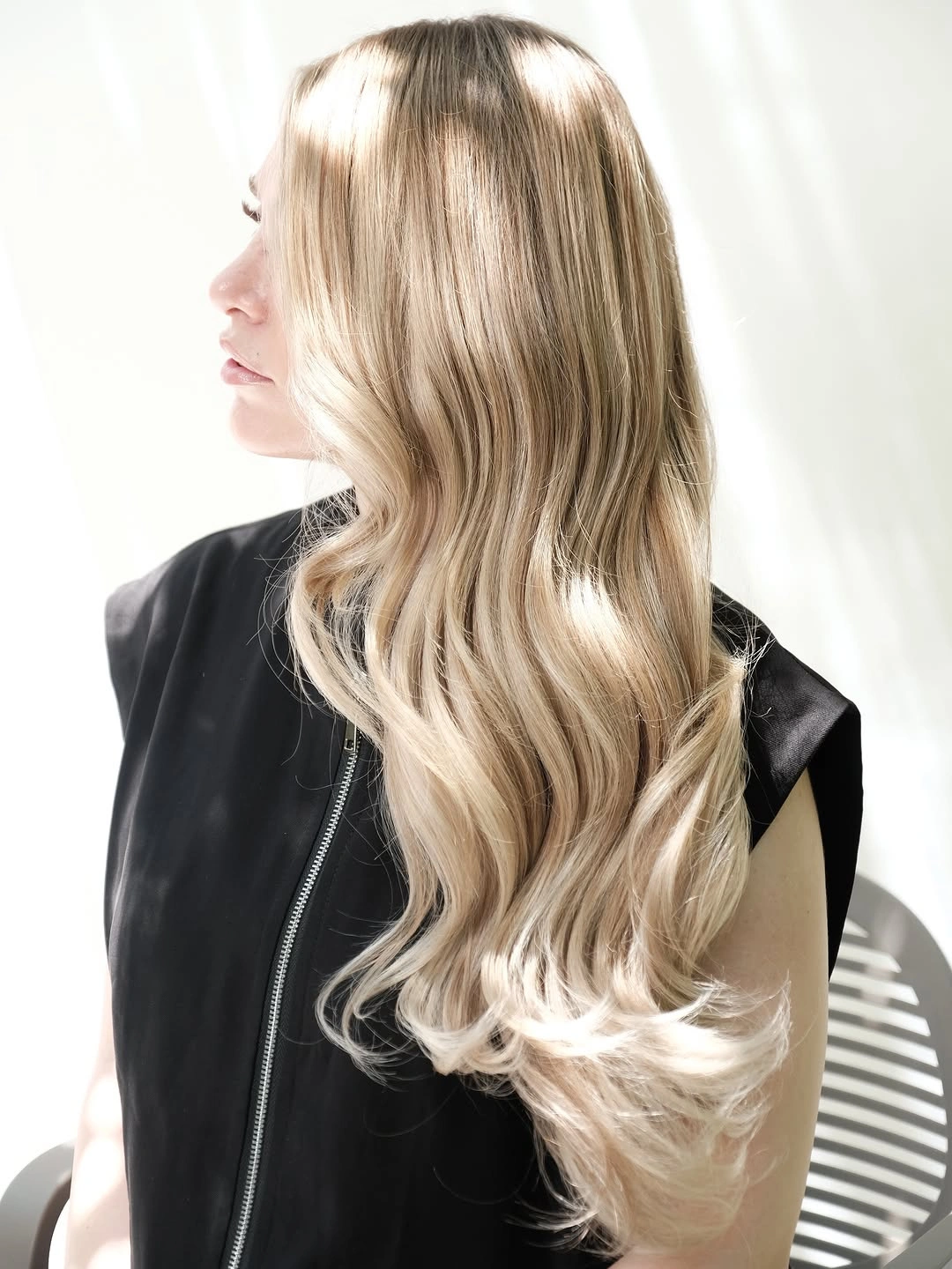 Long beige blonde waves with darker crown