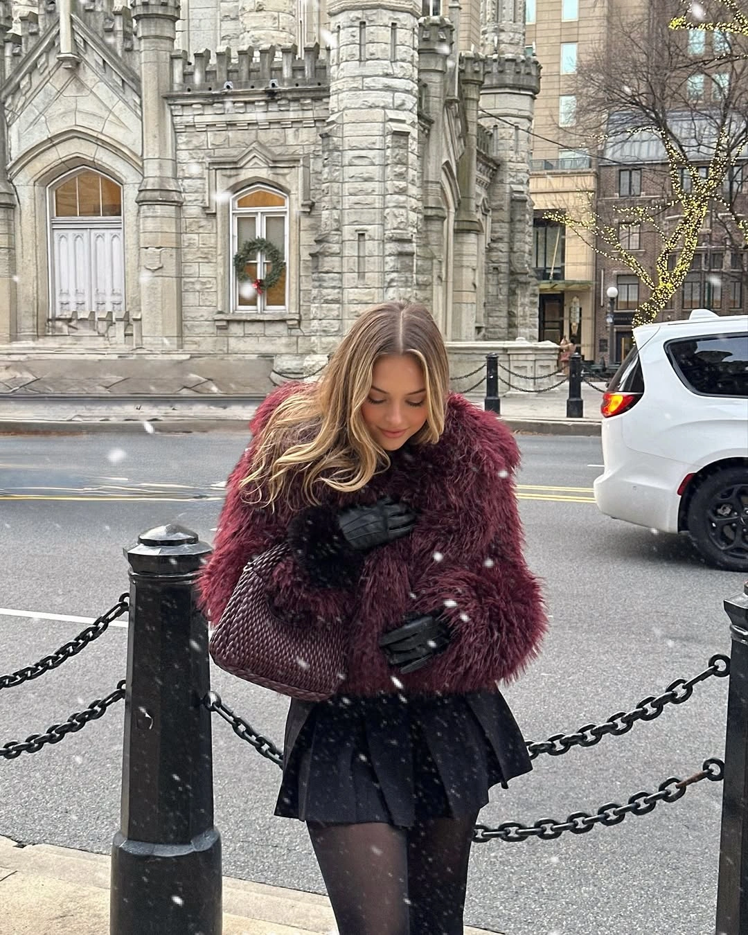 Burgundy cropped jacket with black pleated mini and tights