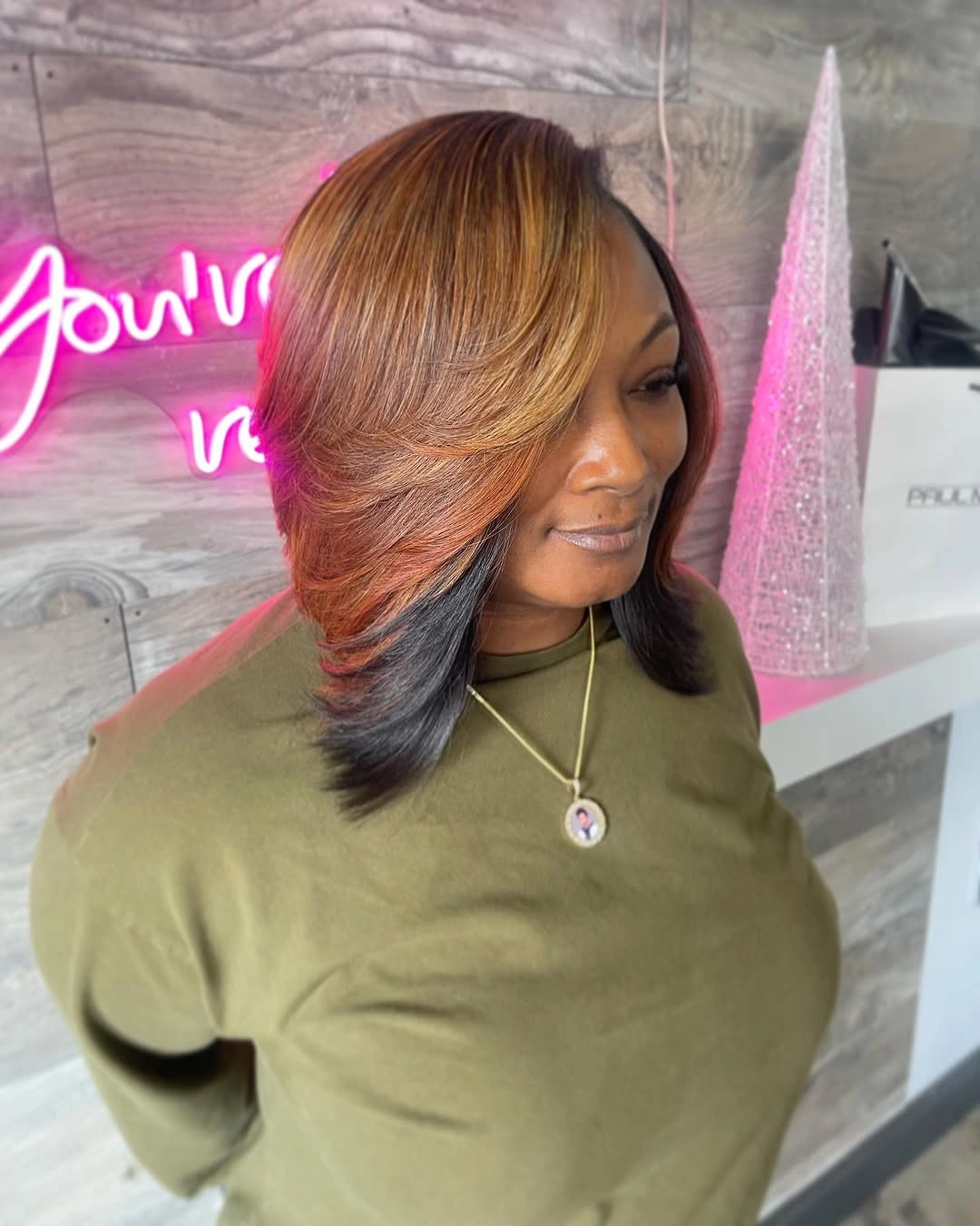 Shoulder length layered hair with honey copper color and dark ends