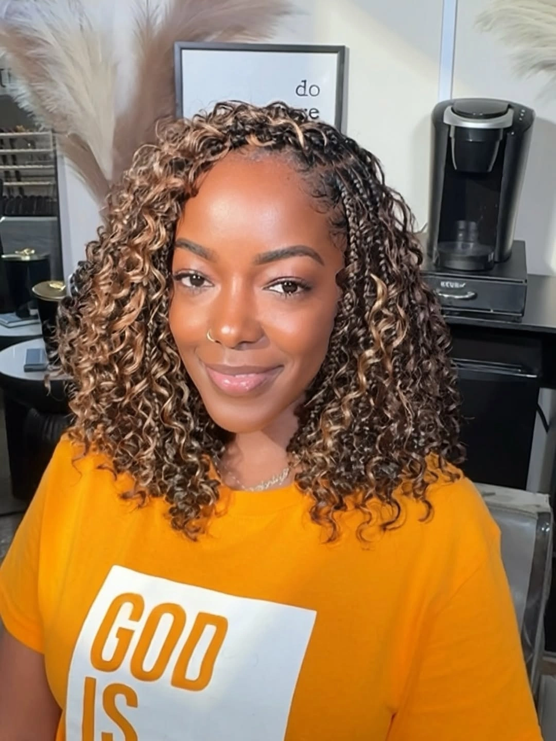 Shoulder length curls with caramel honey pieces and dark root