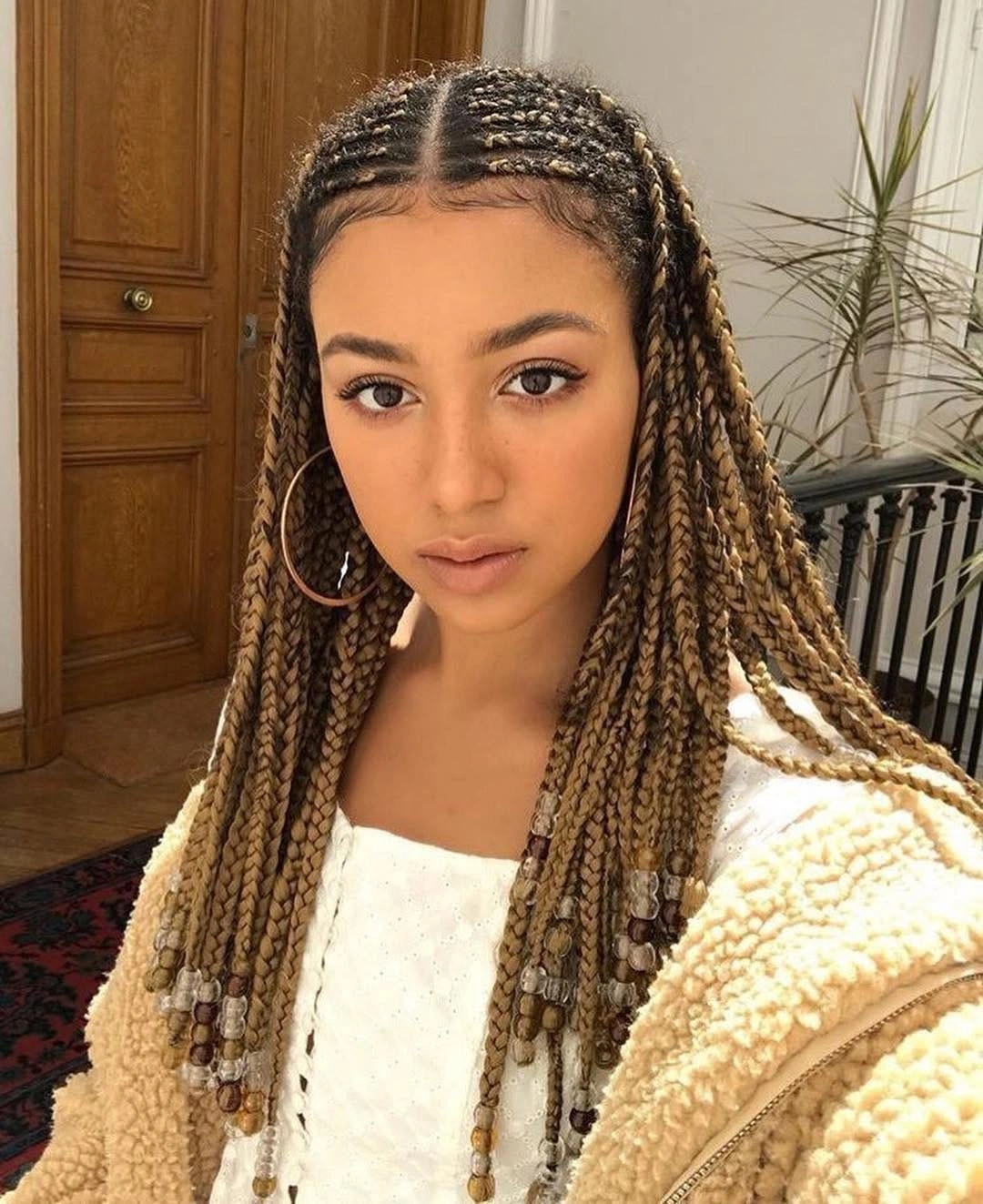 Long small braids with honey blonde beige and brown strands