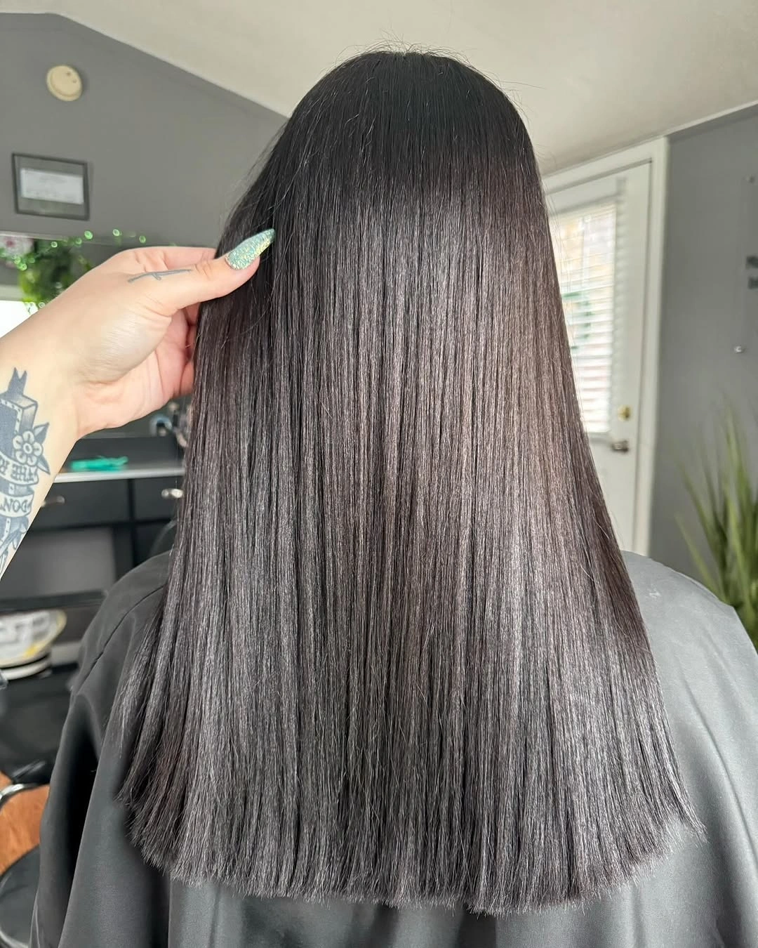 Long straight smoky charcoal brown hair with blunt ends