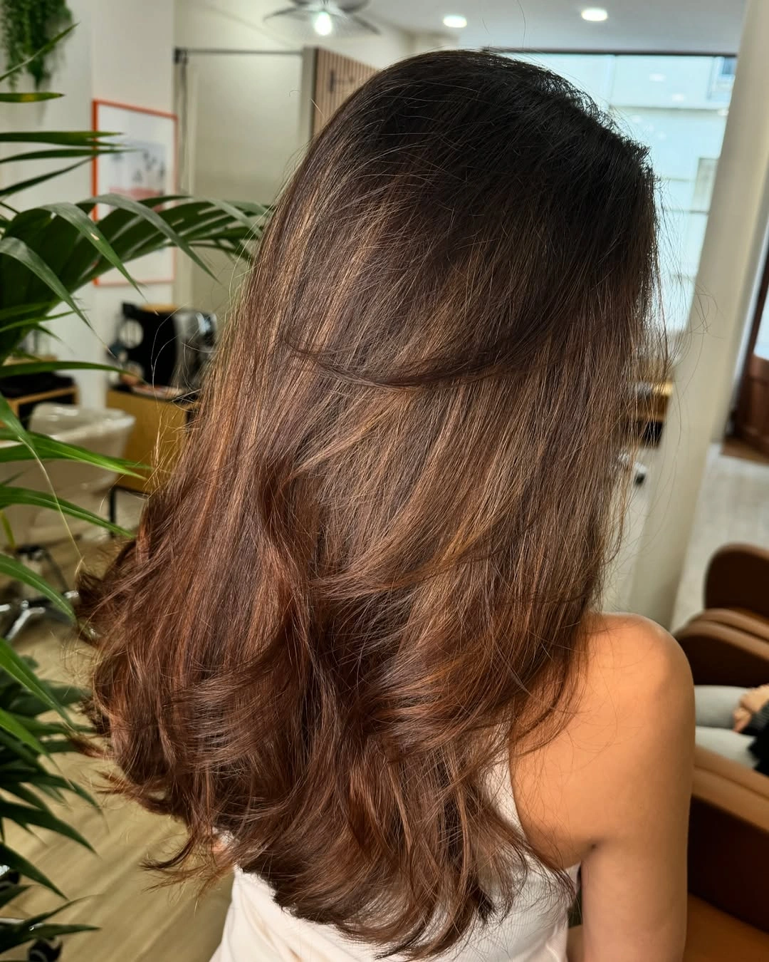 Long brunette waves with copper brown lower sections