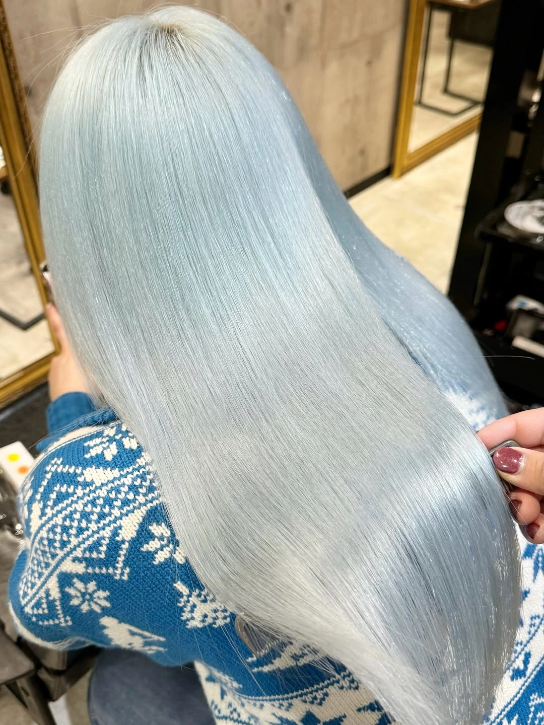 Very long straight pale silver hair with rounded ends