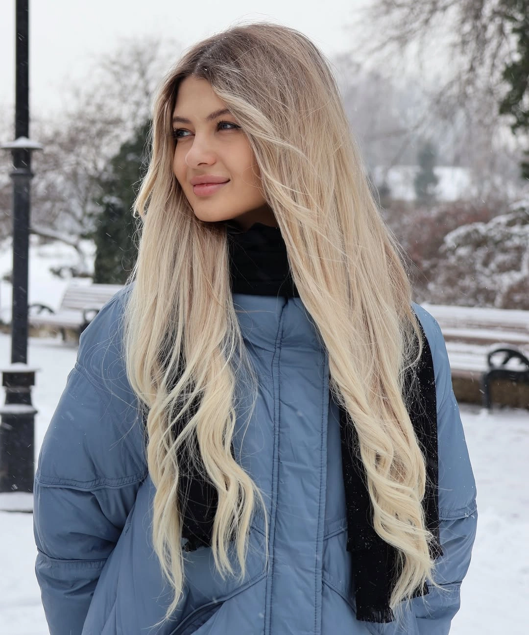 Very long pale blonde hair with soft lower bends