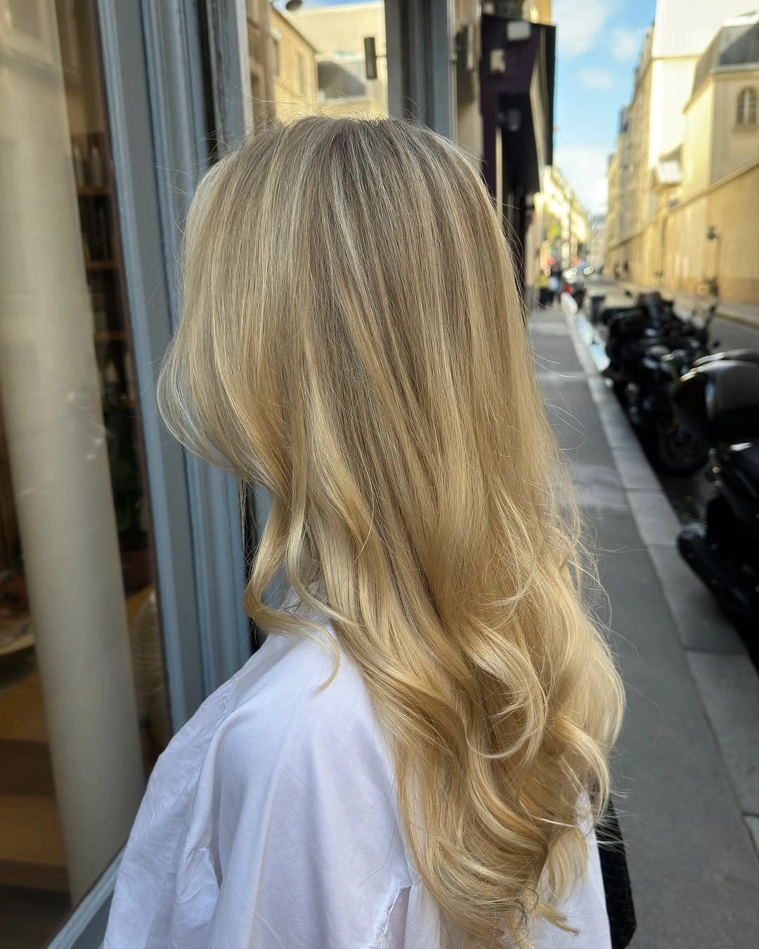 Long blended blonde hair with beige golden strands
