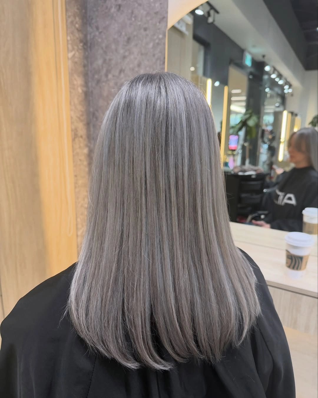 Straight silver gray long layered haircut