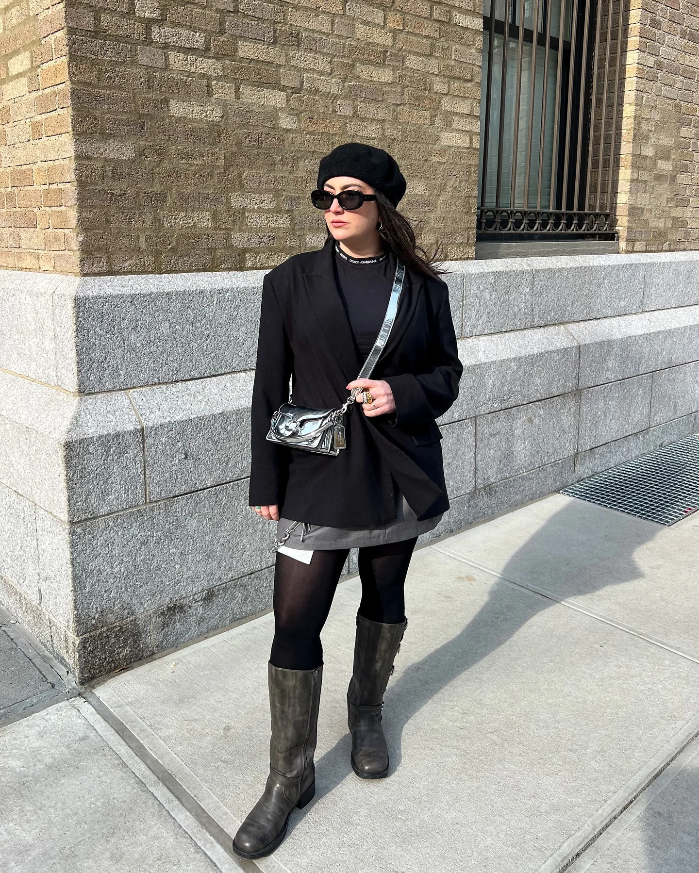 Oversized black blazer with beret, tights and tall boots