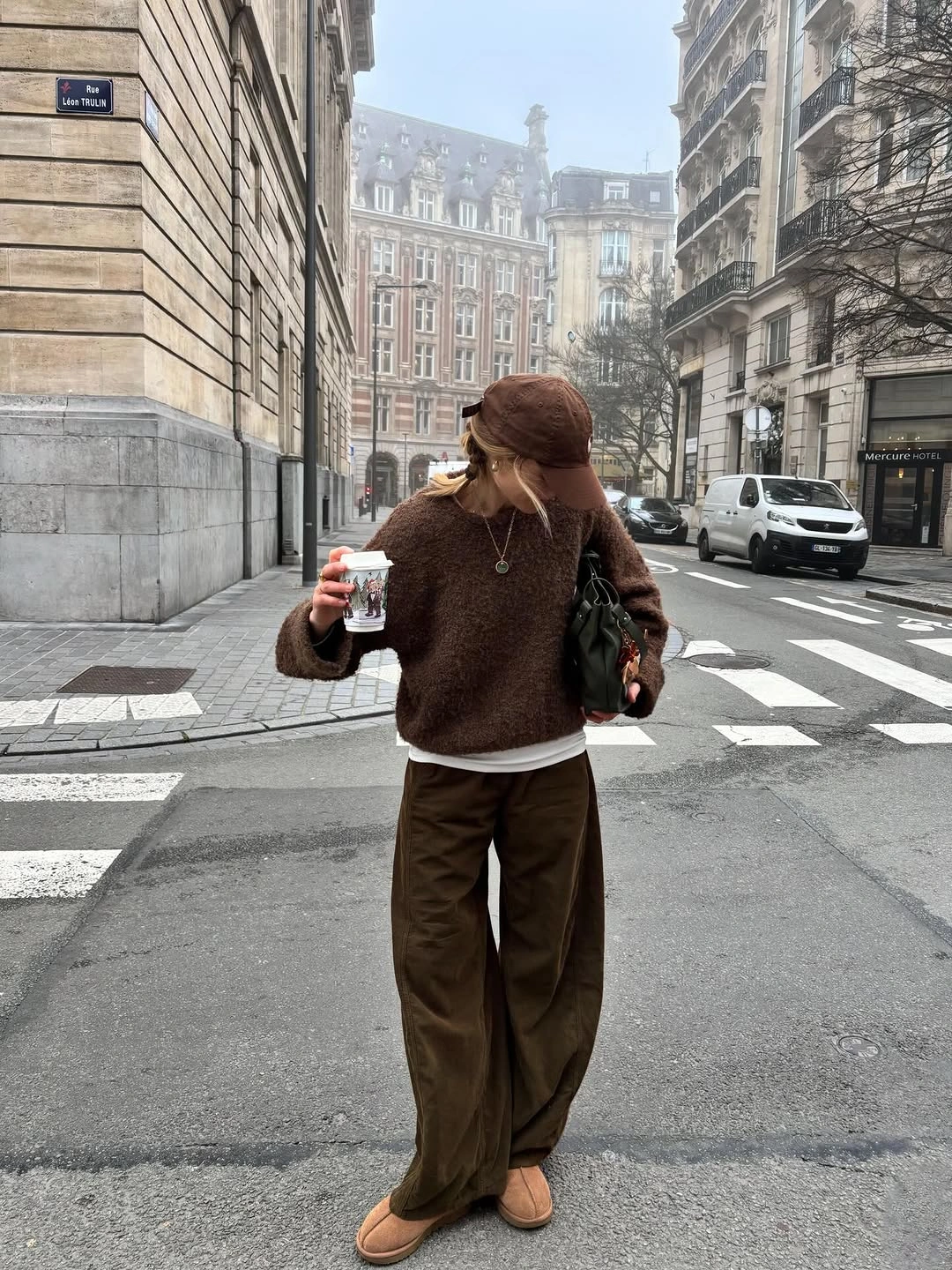 Chocolate brown layered knit with wide brown trousers and tan shoes