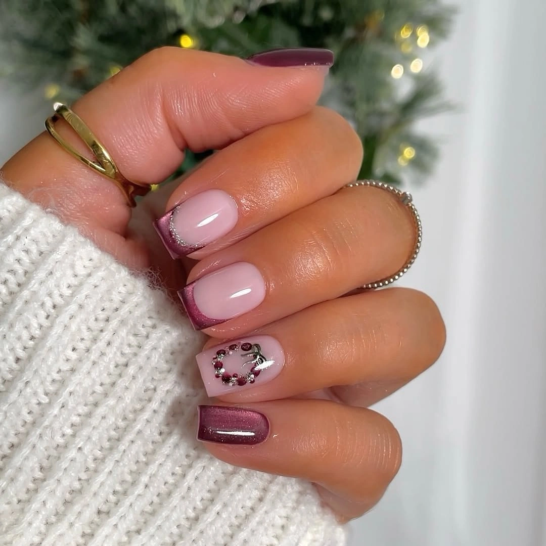 Short square pink nails with burgundy tips and decorative cluster