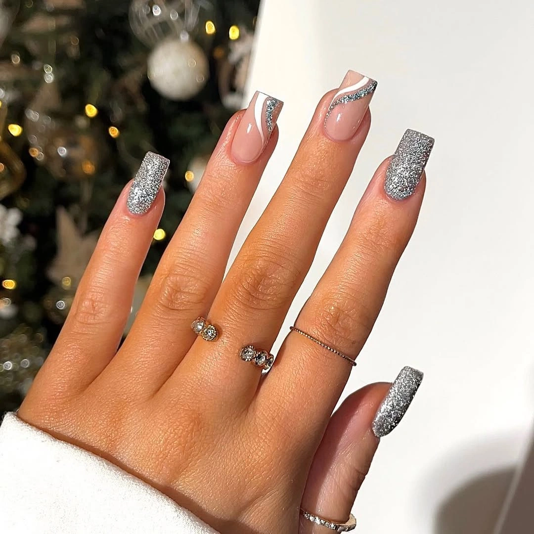 Long square nails with silver glitter and nude accents